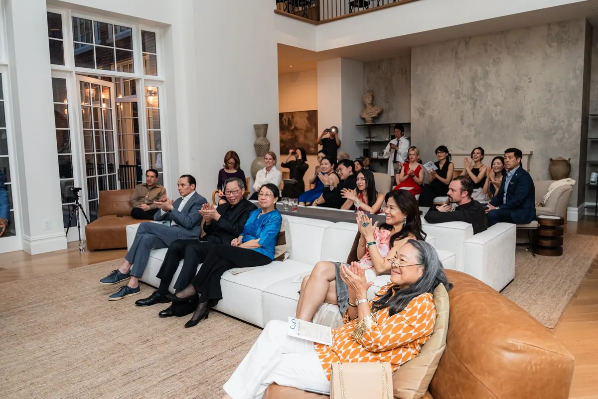 Guests seated for the music in the townhouse