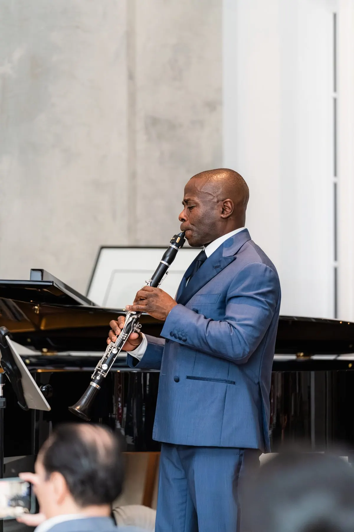 Anthony McGill playing the clarinet in the townhouse